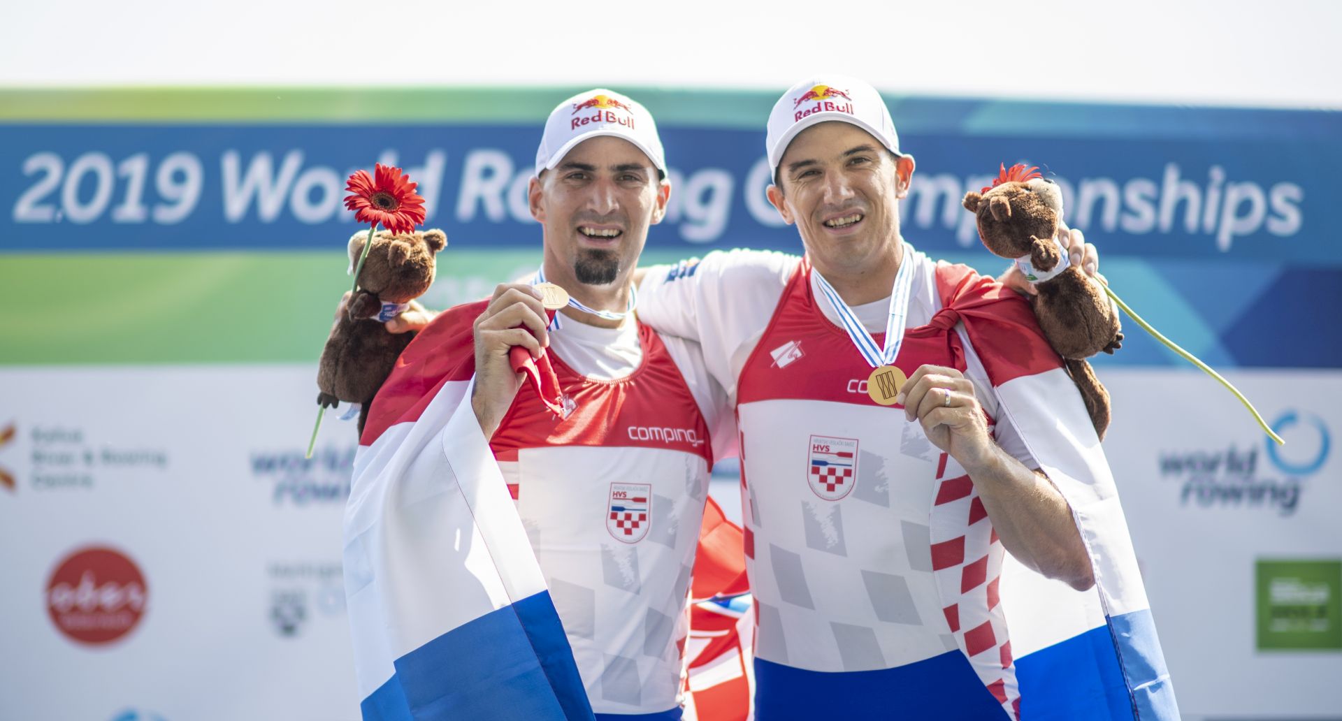 epa07806689 Gold medalists Martin (L) and Valent Sinkovic of Croatia celebrate after winning the Men's Pair Final A at the World Rowing Championship 2019 in Linz-Ottensheim, Austria, 31 August 2019.  EPA/CHRISTIAN BRUNA