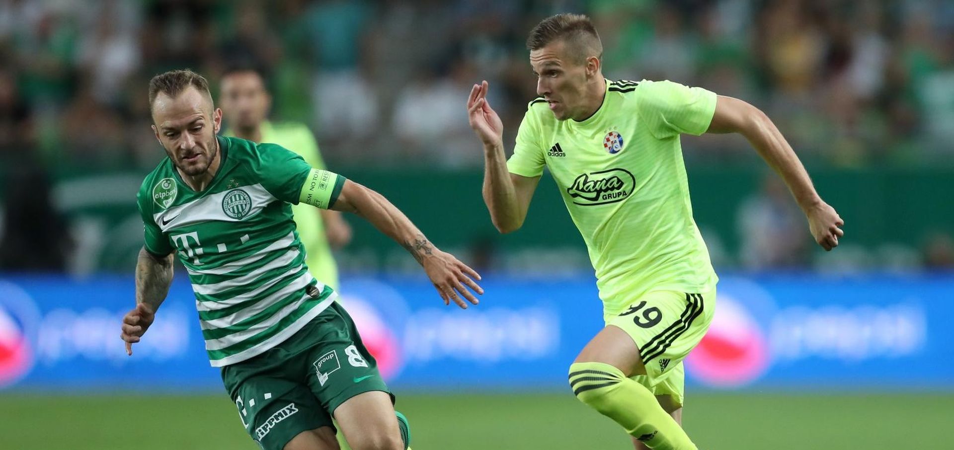 13.08.2019., Groupama Arena, Budimpesta, Madjarska - Uzvratna utakmica 3. pretkola UEFA Lige prvaka, Ferencvarosi TC - GNK Dinamo. Gergo Lovrencsics, Mislav Orsic Photo: Slavko Midzor/PIXSELL