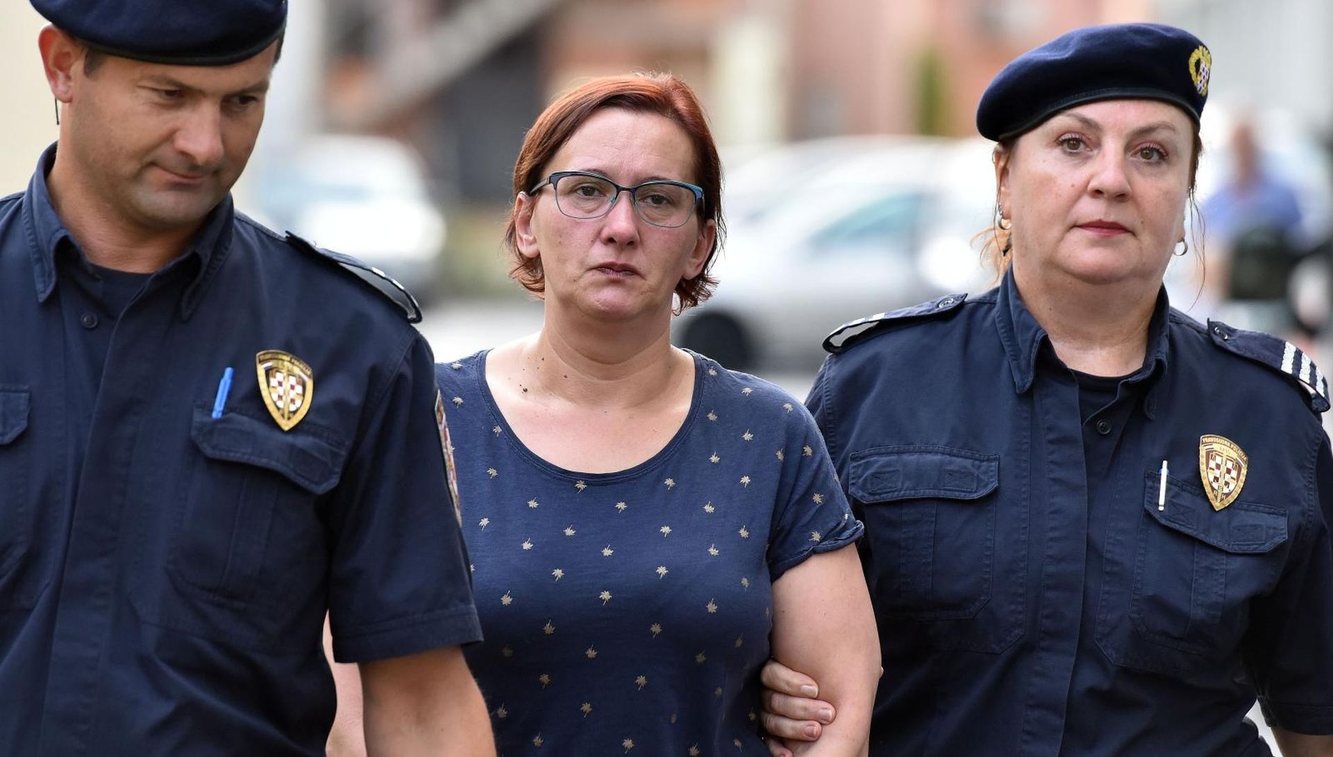 22.08.2019., Varazdin - Policija dovela Smiljanu Srnec na Zupanijski sud na sjednicu Optuznog vijeca. Smiljanu Srnec tereti se da je 2000. godine u obiteljskoj kuci u Palovcu ubila svoju sestru cije je tijelo pronadjeno u zamrzivacu 16. veljace 2019. godine. Photo: Vjeran Zganec Rogulja/PIXSELL