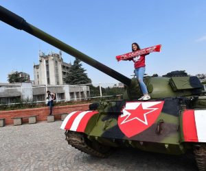 27.08.2019., Beograd, Srbija - Stari JNA tenk T-55 postavljen jucer ispred stadiona Rajko Mitic danas je obojan u crveno-bijele boje Crvene zvezde. Tenk T-55 iz vremena rata s pocetka devedesetih, nije u funkciji i iz njega je sve izvadjeno i zavareno. Photo: Srdjan Ilic/PIXSELL