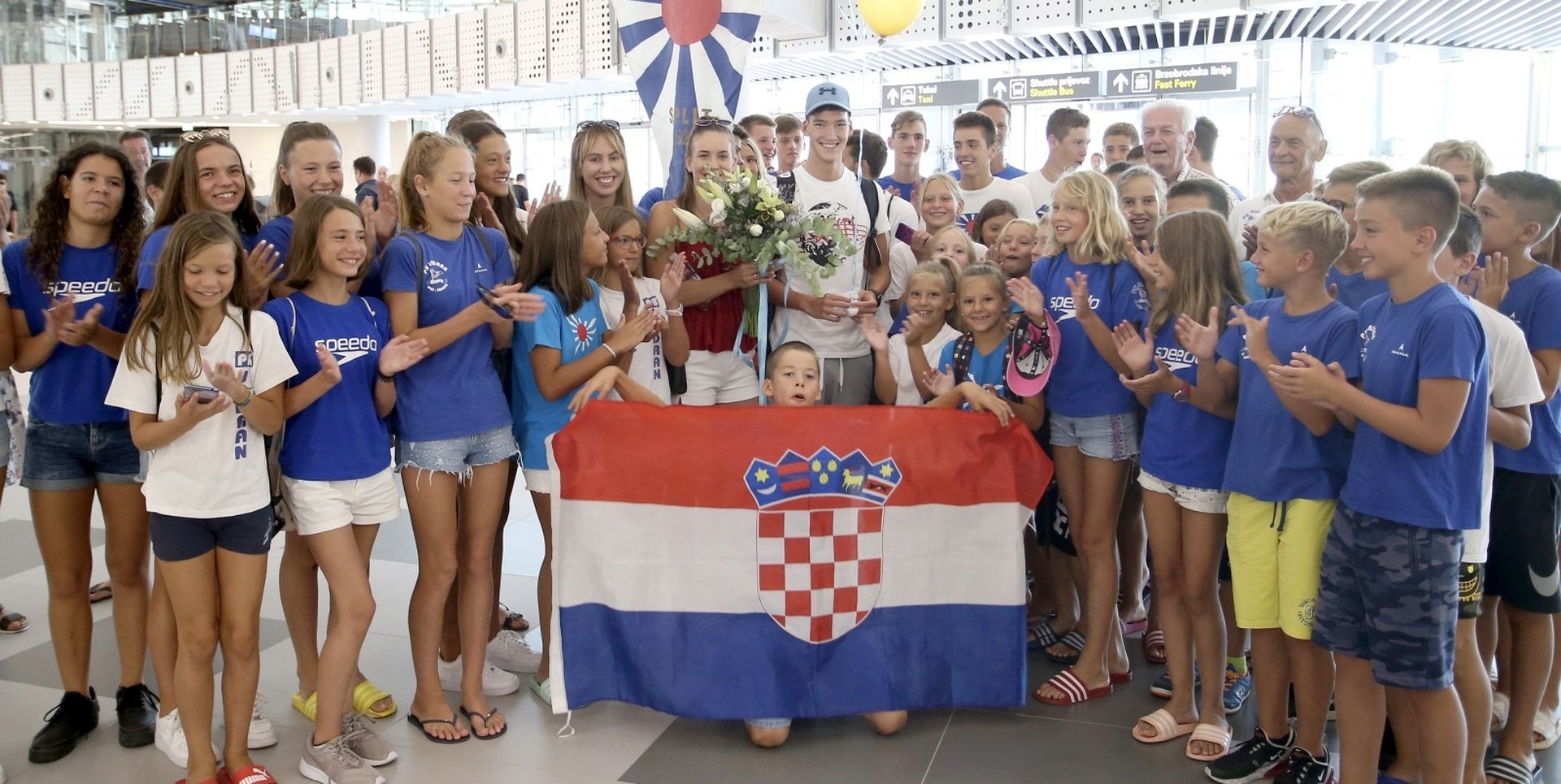 27.08.2019., Split - Docek Franka Grgica, dvostrukog svjetskog juniorskog prvaka u plivanju, u Zracnoj luci Split. 16-godisnji Franko osvojio je zlatnu medalju na 800 metara slobodnim stilom i na 1500 metara slobodnim stilom oborivsi pritom svjetski juniorski rekord. Photo: Ivo Cagalj/PIXSELL