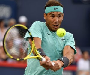 Tennis: Rogers Cup Aug 9, 2019; Montreal, Quebec, Canada; Rafael Nadal of Spain hits a shot against Fabio Fognini of Italy (not pictured) during the Rogers Cup tennis tournament at Stade IGA. Mandatory Credit: Eric Bolte-USA TODAY Sports Eric Bolte
