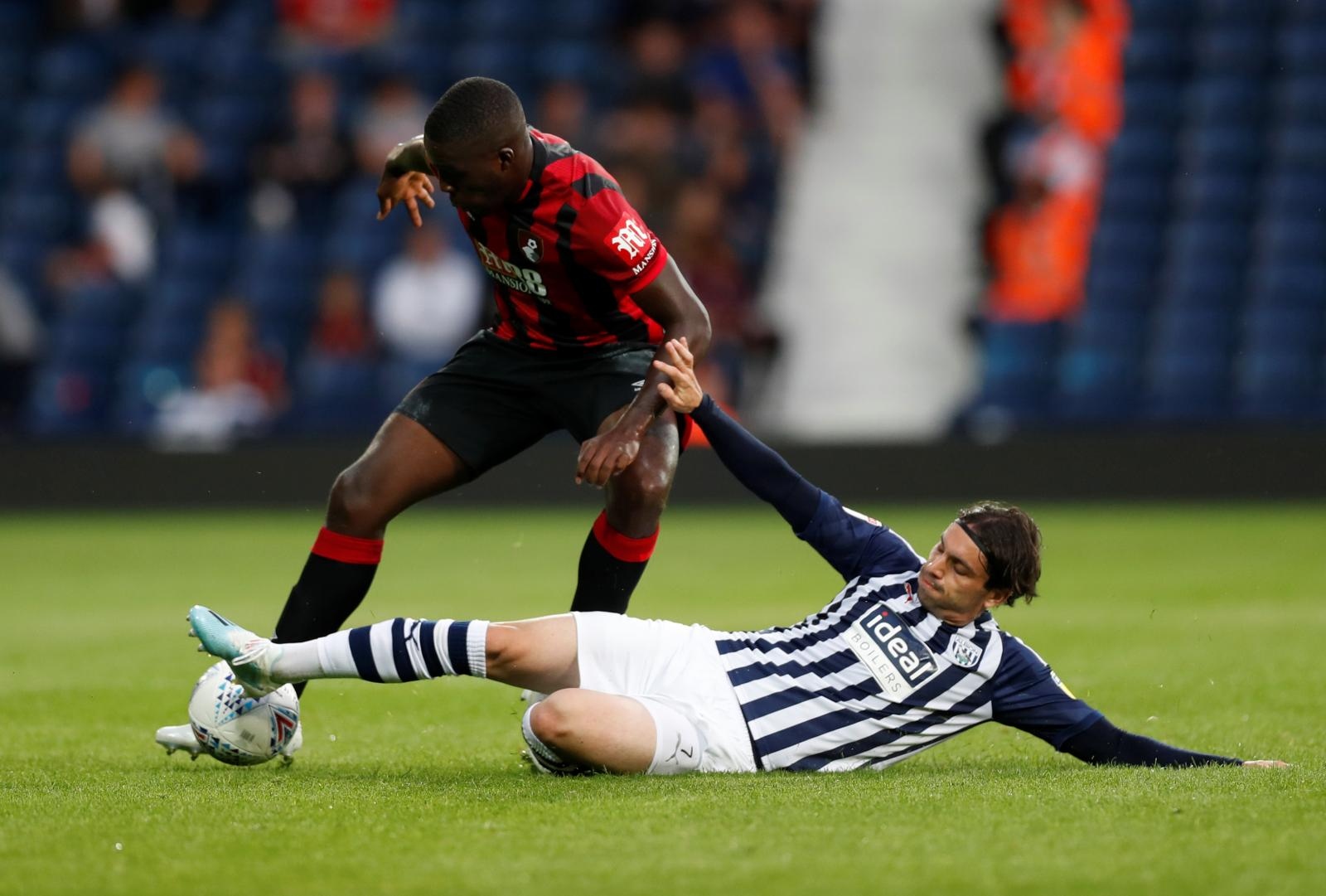 Pre Season Friendly - West Bromwich Albion v AFC Bournemouth Soccer Football - Pre Season Friendly - West Bromwich Albion v AFC Bournemouth - The Hawthorns, West Bromwich, Britain - July 26, 2019   West Brom's Filip Krovinovic in action with AFC Bournemouth's Nnamdi Ofoborh   Action Images via Reuters/Matthew Childs MATTHEW CHILDS