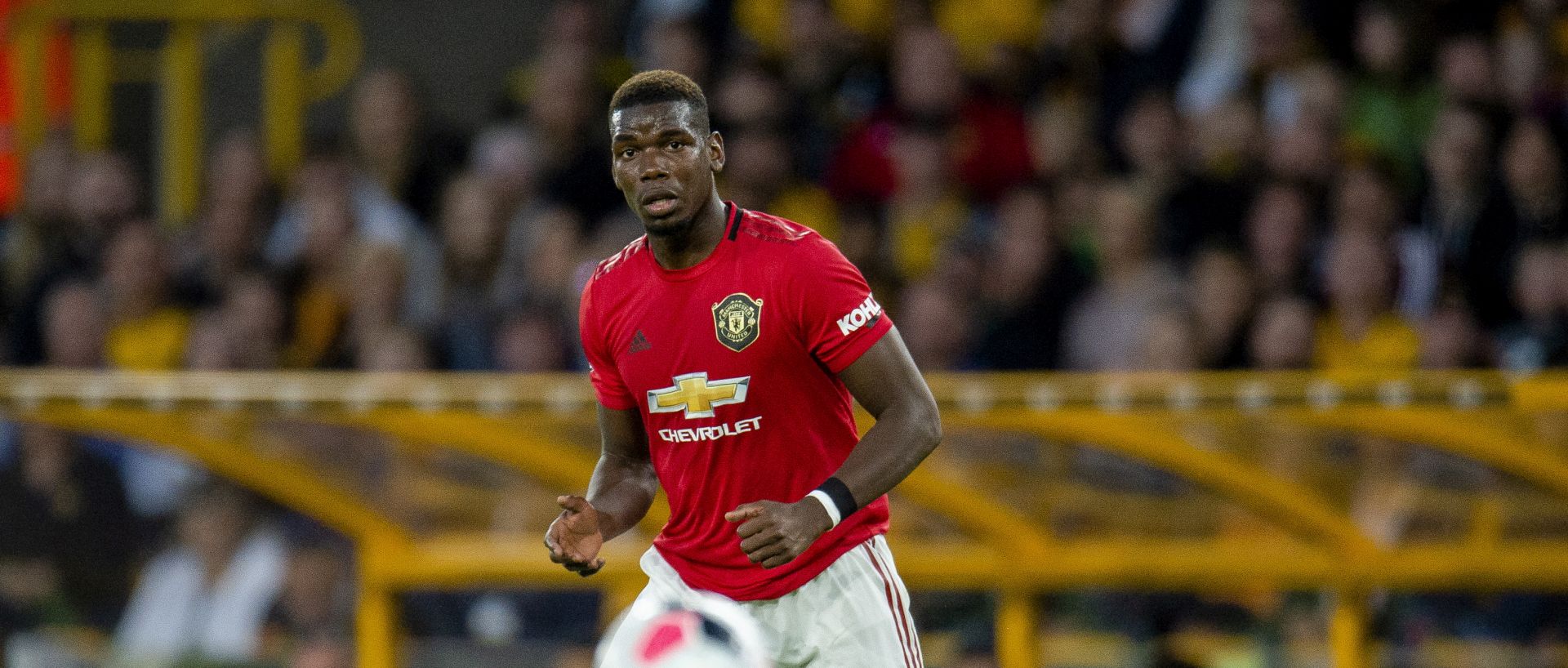 epa07783748 Manchester United's Paul Pogba in action during the English Premier League soccer match between Wolverhampton Wanderers and Manchester United held at the Molineux stadium in Wolverhampton, Britain, 19 August 2019 (issued 21 August 2019). Manchester United condemned racial abuse of Pogba from their own supporters on social media.  EPA/PETER POWELL EDITORIAL USE ONLY. No use with unauthorized audio, video, data, fixture lists, club/league logos or 'live' services. Online in-match use limited to 120 images, no video emulation. No use in betting, games or single club/league/player publications.