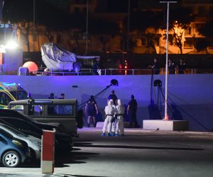 epa07789530 Officials on board an AFM vessel after some 356 migrants, who had been stranded on the NGO rescue ship Ocean Viking for 13 days in the Mediterranean, arrived at Hay Wharf maritime base in Floriana, Malta, late 23 August 2019 (issued 24 August 2019). Some 356 African migrants aboard the rescue ship Ocean Viking migrants will be re-distributed to six other EU states (France, Germany, Ireland, Luxembourg, Portugal and Romania), the Maltese government said.  EPA/STRINGER