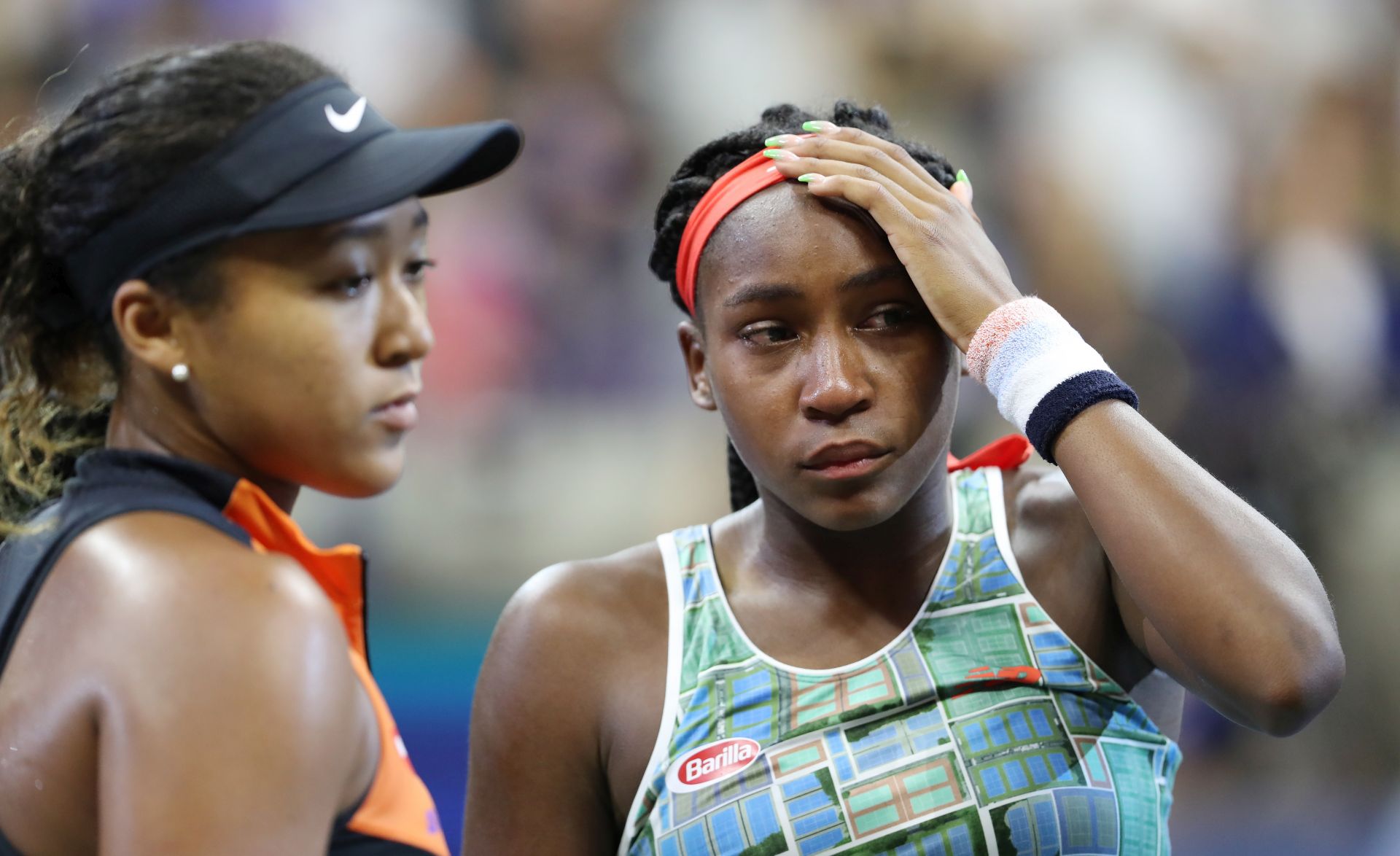 epa07808929 Naomi Osaka of Japan (L) consoles Coco Gauff of the US after their match on the sixth day of the US Open Tennis Championships the USTA National Tennis Center in Flushing Meadows, New York, USA, 31 August 2019. The US Open runs from 26 August through 08 September.  EPA/DANIEL MURPHY