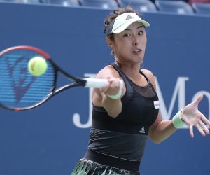 epa07810781 Qiang Wang of China hits a return to Ashleigh Barty of Australia during their match on the seventh day of the US Open Tennis Championships the USTA National Tennis Center in Flushing Meadows, New York, USA, 01 September 2019. The US Open runs from 26 August through 08 September.  EPA/PETER FOLEY