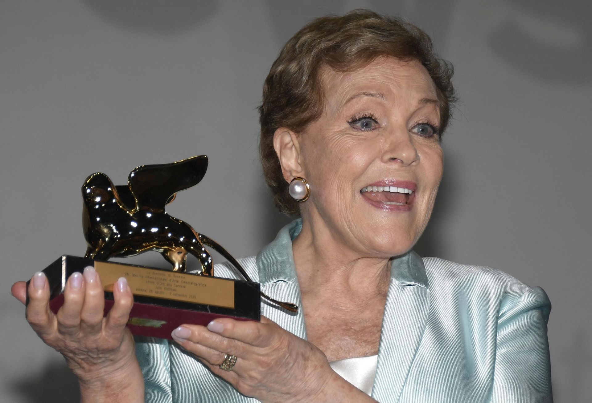 epa07812775 British actress Julie Andrews poses after she received the Golden Lion for Lifetime Achievement Award during the 76th annual Venice International Film Festival, in Venice, Italy, 02 September 2019. The festival runs from 28 August to 07 September.  EPA/CLAUDIO ONORATI