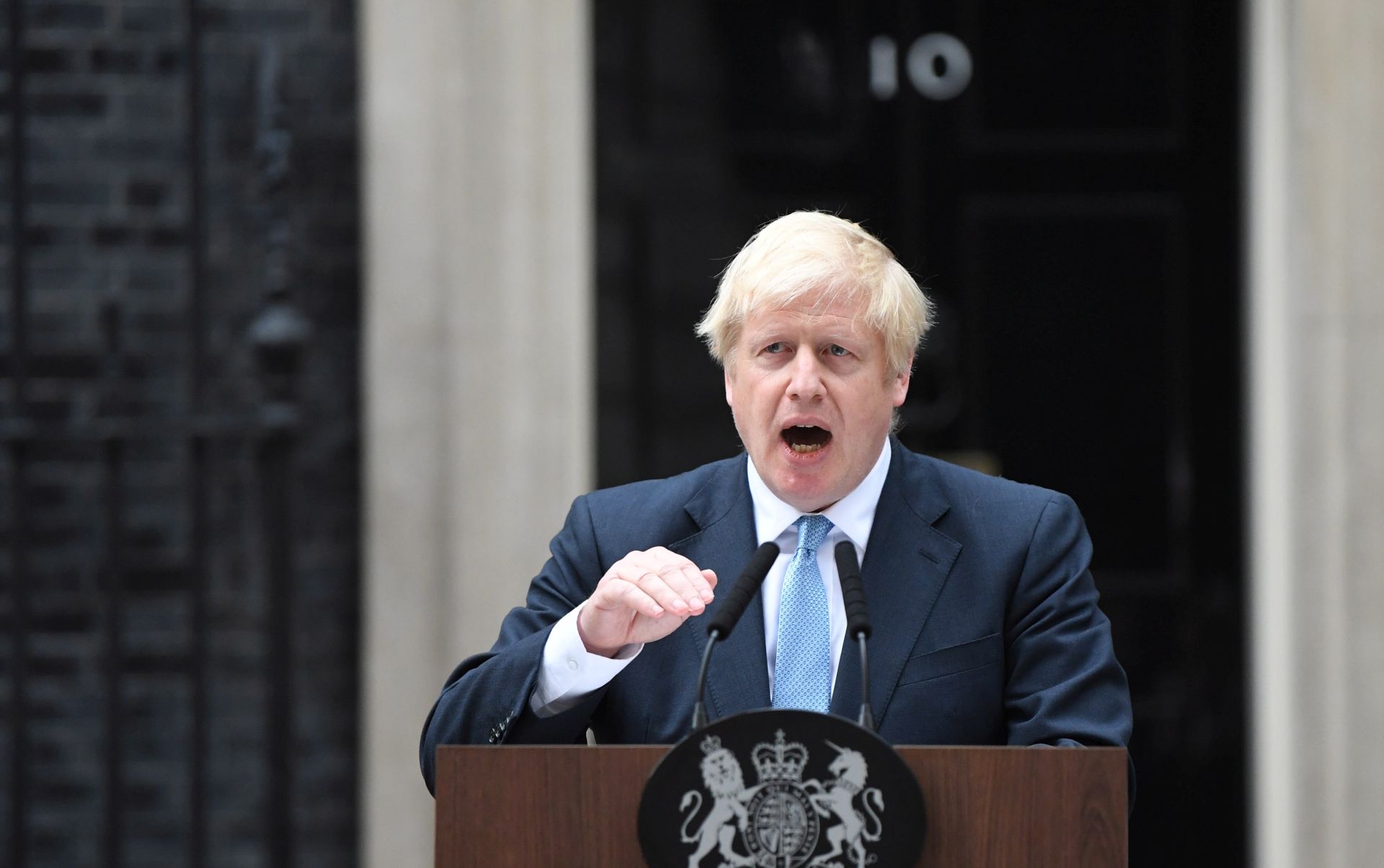 epa07813388 British Prime Minister, Boris Johnson delivers a statement outside 10 Downing street in Westminster, central London, Britain, 02 September 2019. Britain's Prime Minister Boris Johnson has said Britain must leave the EU on 31 October, with or without a deal, prompting a number of British Members of Parliament to unite to try to prevent leaving without an agreement as Parliament assembles on 03 September 2019.  EPA/NEIL HALL
