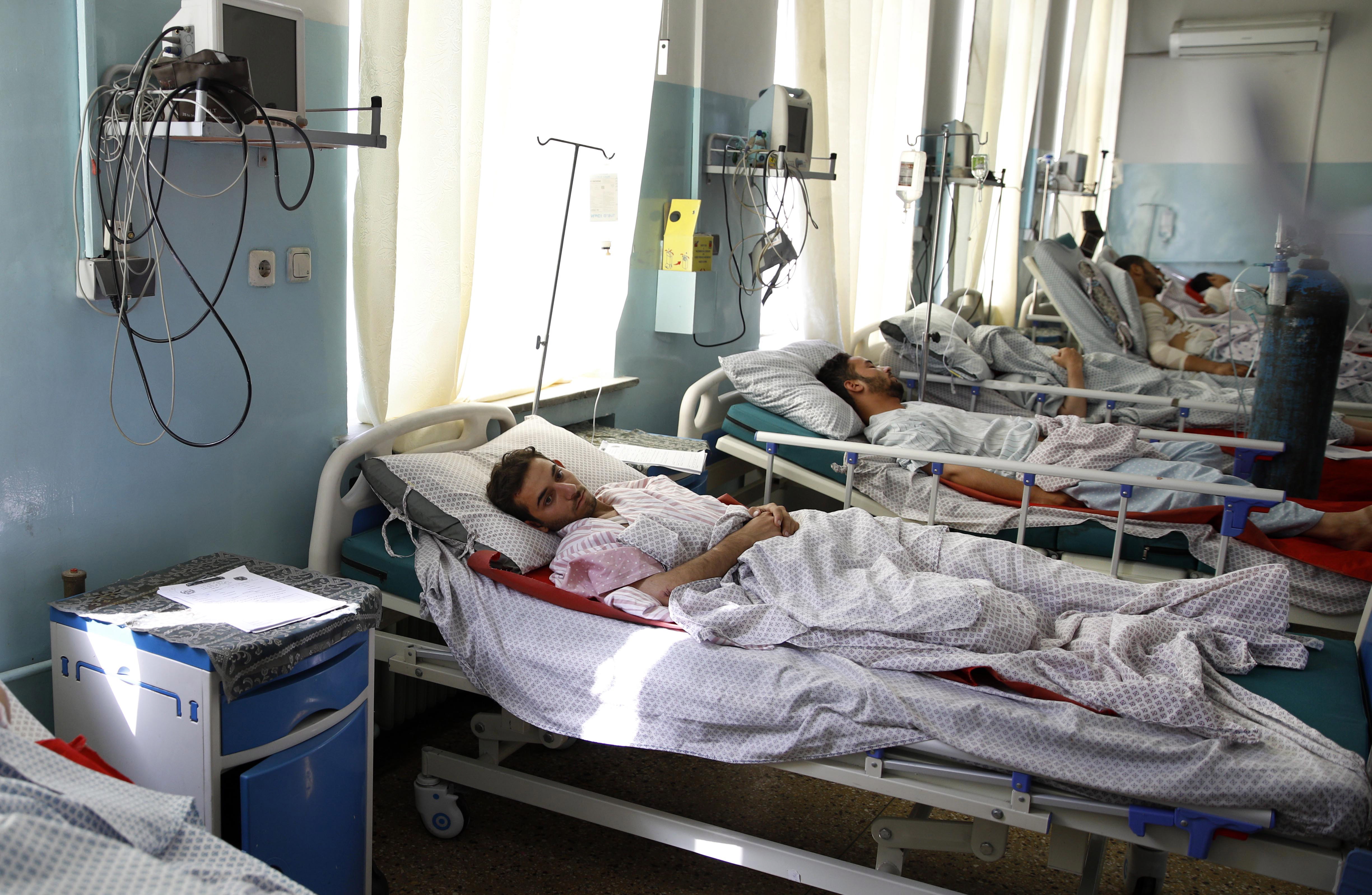 epa07814021 People, who were injured in a truck bomb blast, which targeted Green Village compound, receive medical treatment at a hospital in Kabul, Afghanistan, 03 September 2019. At least 16 people were killed and 119 others were wounded in a truck bomb attack in the east of Kabul, at a residential area for foreign nationals a spokesman for the Ministry of Interior, Nusrat Rahimi, said.  EPA/HEDAYATULLAH AMID