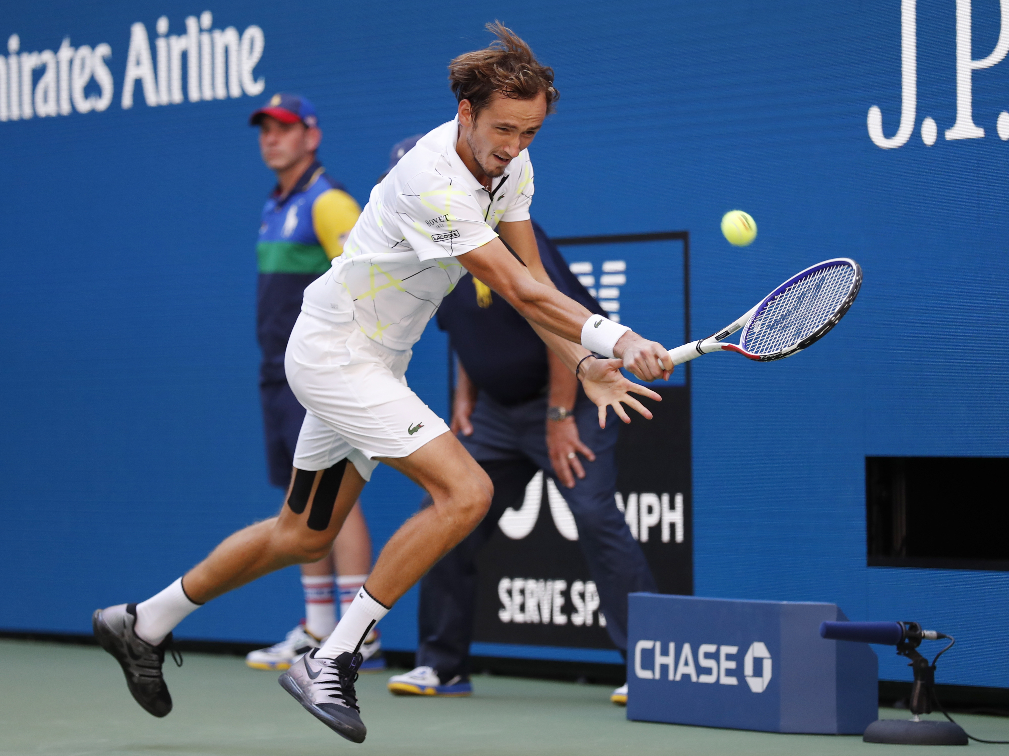 epa07815407 Daniil Medvedev of Russia hits a return to Stan Wawrinka of Switzerland during their quarter-finals round match on the ninth day of the US Open Tennis Championships the USTA National Tennis Center in Flushing Meadows, New York, USA, 03 September 2019. The US Open runs from 26 August through 08 September.  EPA/JOHN G. MABANGLO