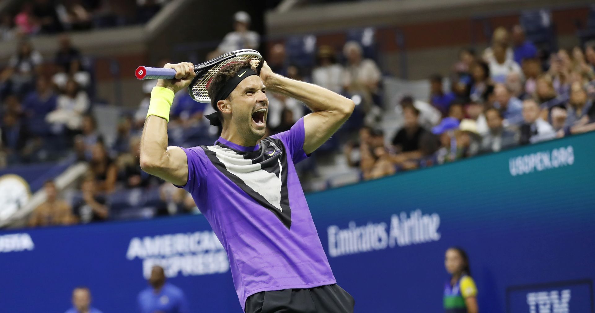 epa07815828 Grigor Dimitrov of Bulgaria celebrates after defeating Roger Federer of Switzerland during their quarter-finals round match on the ninth day of the US Open Tennis Championships the USTA National Tennis Center in Flushing Meadows, New York, USA, 03 September 2019. The US Open runs from 26 August through 08 September.  EPA/JOHN G. MABANGLO
