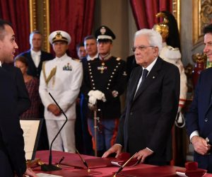 epa07818661 Italian Minister of Foreign Affairs Luigi Di Maio (L) stands in front of Italian Premier Giuseppe Conte (R) and President Sergio Mattarella (C) during the new government's swearing-in at Quirinal Palace, Rome, Italy, 05 September 2019. Italian Prime Minister Giuseppe Conte's new government is a coalition between the anti-establishment 5-Star Movement (M5S) and the center-left Democratic Party (PD) that will have 21 ministers, 10 from the M5S, nine from the PD and one from the small leftwing Free and Equal (LeU) party, media reported.  EPA/ALESSANDRO DI MEO