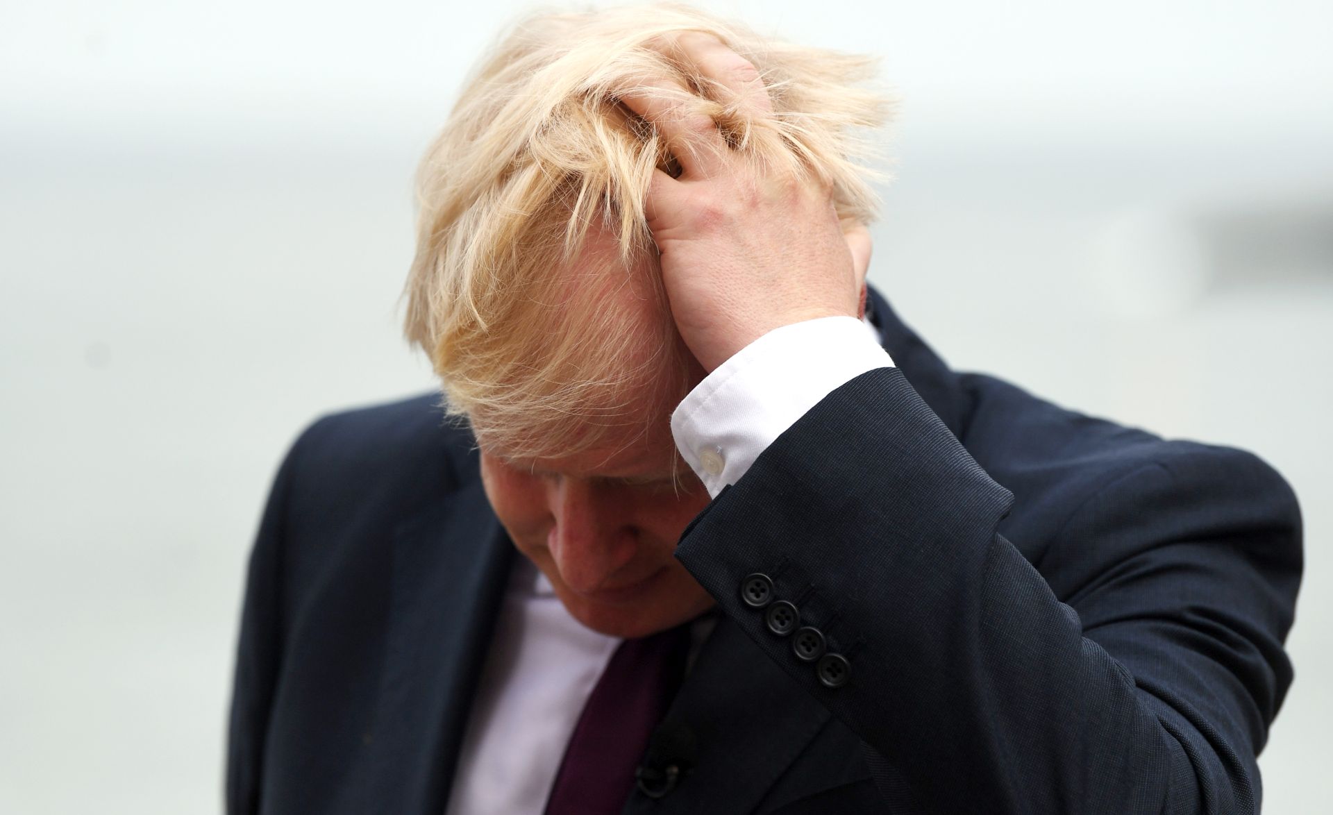 epa07823061 (FILE) - Britain's Prime Minister Boris Johnson reacts during a TV interview ahead of bilateral meetings as part of the G7 summit in Biarritz, France, 25 August 2019  (reissued 06 September 2019). According to media reports, the British House of Lords approved the new law against a no-deal Brexit on 06 September 2019.  EPA/NEIL HALL