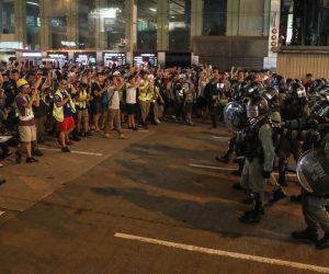 epa07823011 Riot police advance to disperse protesters attending a rally against police's violence at Mong Kok, in Hong Kong, China, 06 September 2019. Hong Kong Chief Executive Carrie Lam announced on 05 September the withdrawal of a controversial extradition bill that could allow the transfer of criminal suspects to mainland China after three months of protests across the territory. The full withdrawal of the bill, which was introduced in April and then suspended in June, is one of five key demands of protesters, who are demanding for full democratic rights.  EPA/JEON HEON-KYUN