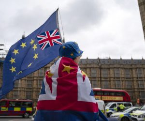 epa07835611 An Anti-Brexit protester sits outside the Houses of Parliament, Central London, Britain, 11 September 2019. Judges at the Court of Session in Scotland ruled today that proroguing of Parliament by British Prime Minister Boris Johnson was unlawful and the case will be heard at the Supreme Court in London next week.  EPA/WILL OLIVER