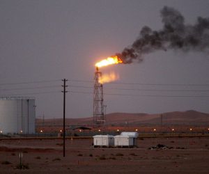 epa07841156 (FILE) - A gas flame behind pipelines in the desert at Khurais oil field, about 160 km from Riyadh, Kingdom of Saudi Arabia, 23 June 2008 (reissued 14 September 2019). According to Saudi state-owned oil company Aramco, two of its oil facilities in Saudi Arabia, Khurais and Abqaiq, were set on fire after allegedly having been targeted by drone attacks.  EPA/ALI HAIDER *** Local Caption *** 55191226