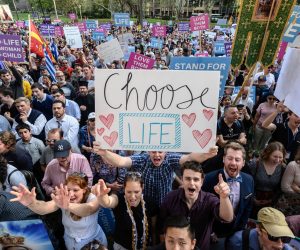 epa07844258 Protesters hold a pro-life banner during an anti-abortion rally in Hyde Park in Sydney, New South Wales, Australia, 15 September 2019. Members of Parliament (MPs) joined pro-life and pro-family groups, women's advocates, faith leaders and thousands of people from across the state to rally against the Reproductive Health Care Reform Bill 2019.  EPA/JAMES GOURLEY  AUSTRALIA AND NEW ZEALAND OUT