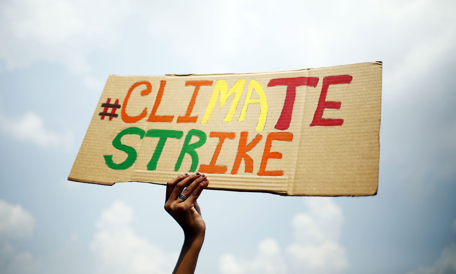 epa07855498 Bangladeshi school and college students hold a placard during the global climate change strike in Dhaka, Bangladesh, 20 September 2019. According to the Save the Children in Bangladesh and Green Savers Association they supported this strike as children and youth staged a protest in Dhaka to urge global leaders to act against climate change.  EPA/MONIRUL ALAM