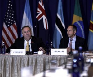 epa07871387 US Secretary of State Mike Pompeo (L) speaks the Energy Resource Governance Initiative conference at  the Lotte New York  Palace Hotel in New York, New York, USA, 26 September 2019. The conference is to promote sound governance and resilient energy mineral supply chains.  EPA/Peter Foley