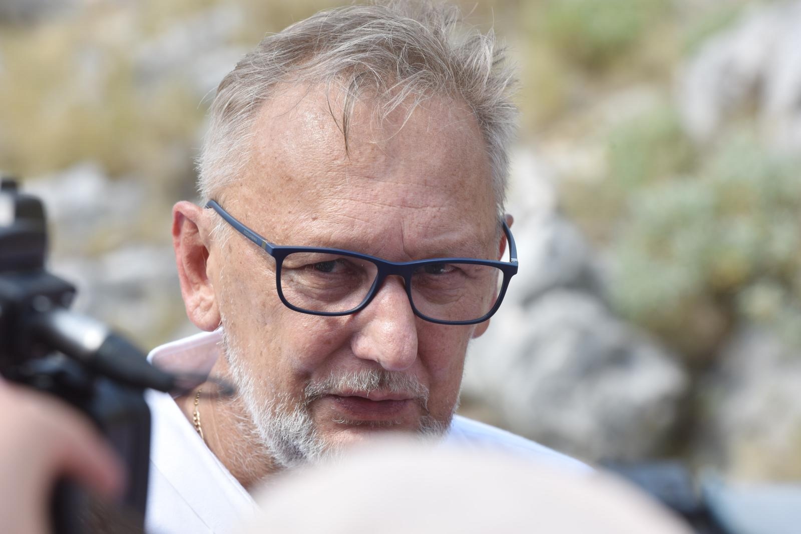 30.08.2019., Kornati - Na otoku Kornatu obiljezena je 12. obljetnica stradanja 12 vatrogasaca iz Tisnog, Vodica i Sibenika u Kornatskoj tragediji. Potpredsjednik Vlade i ministar unutarnjih poslova Davor Bozinovic
Photo: Hrvoje Jelavic/PIXSELL