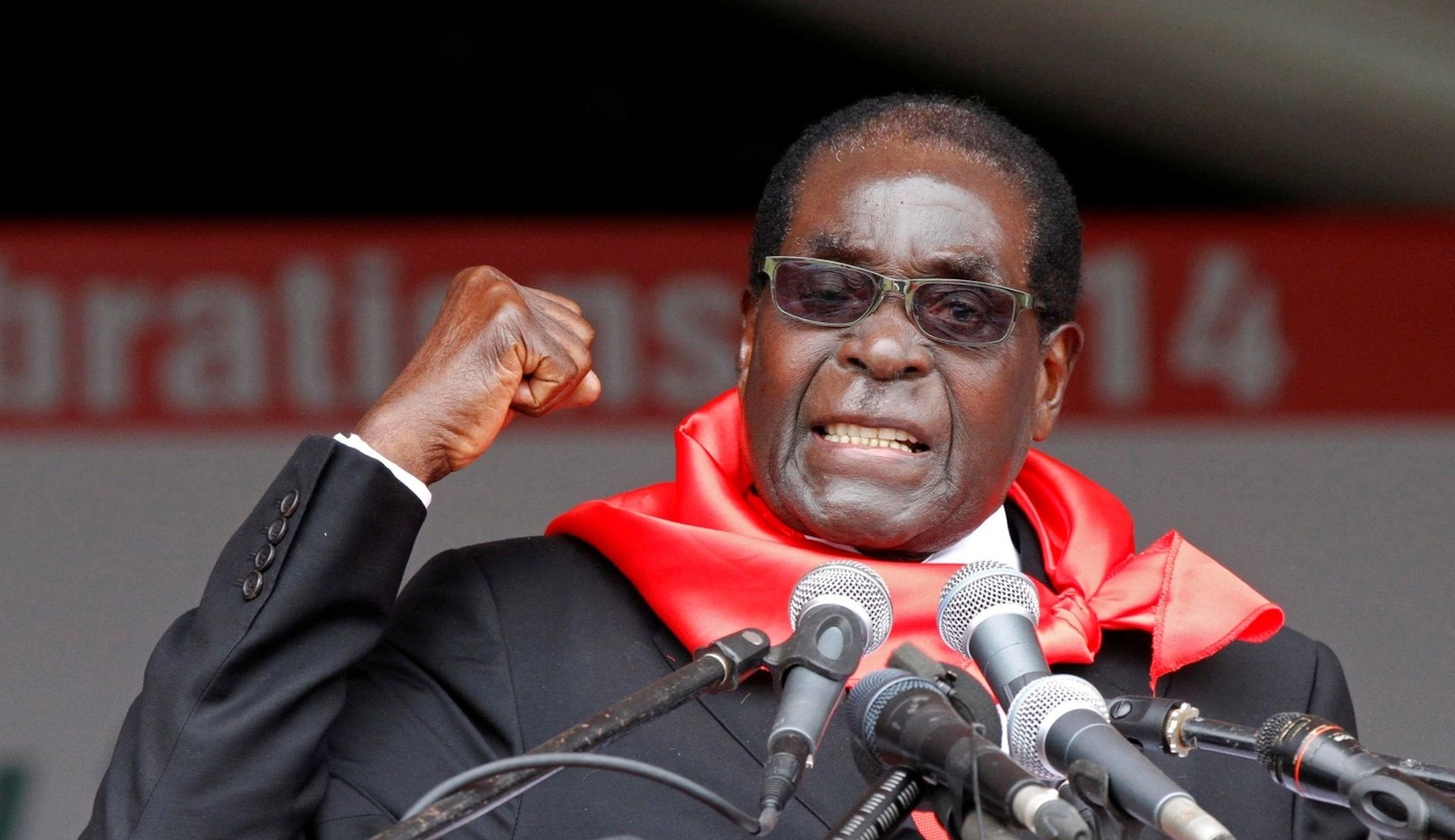 FILE PHOTO:  Zimbabwe President Robert Mugabe addresses supporters during celebrations to mark his 90th birthday in Marondera FILE PHOTO:  Zimbabwe President Robert Mugabe addresses supporters during celebrations to mark his 90th birthday in Marondera about 80km ( 50 miles) east of the capital Harare,  February 23, 2014. REUTERS/Philimon Bulawayo/File Photo Philimon Bulawayo