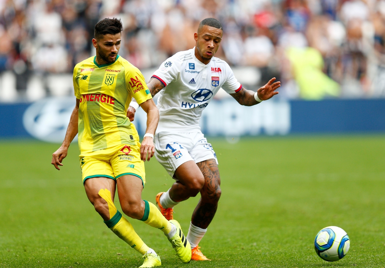 Ligue 1 - Olympique Lyonnais v Nantes Soccer Football - Ligue 1 - Olympique Lyonnais v Nantes - Groupama Stadium, Lyon, France - September 28, 2019  Olympique Lyonnais' Memphis Depay in action with Olympique Lyonnais' Memphis Depay                REUTERS/Emmanuel Foudrot EMMANUEL FOUDROT