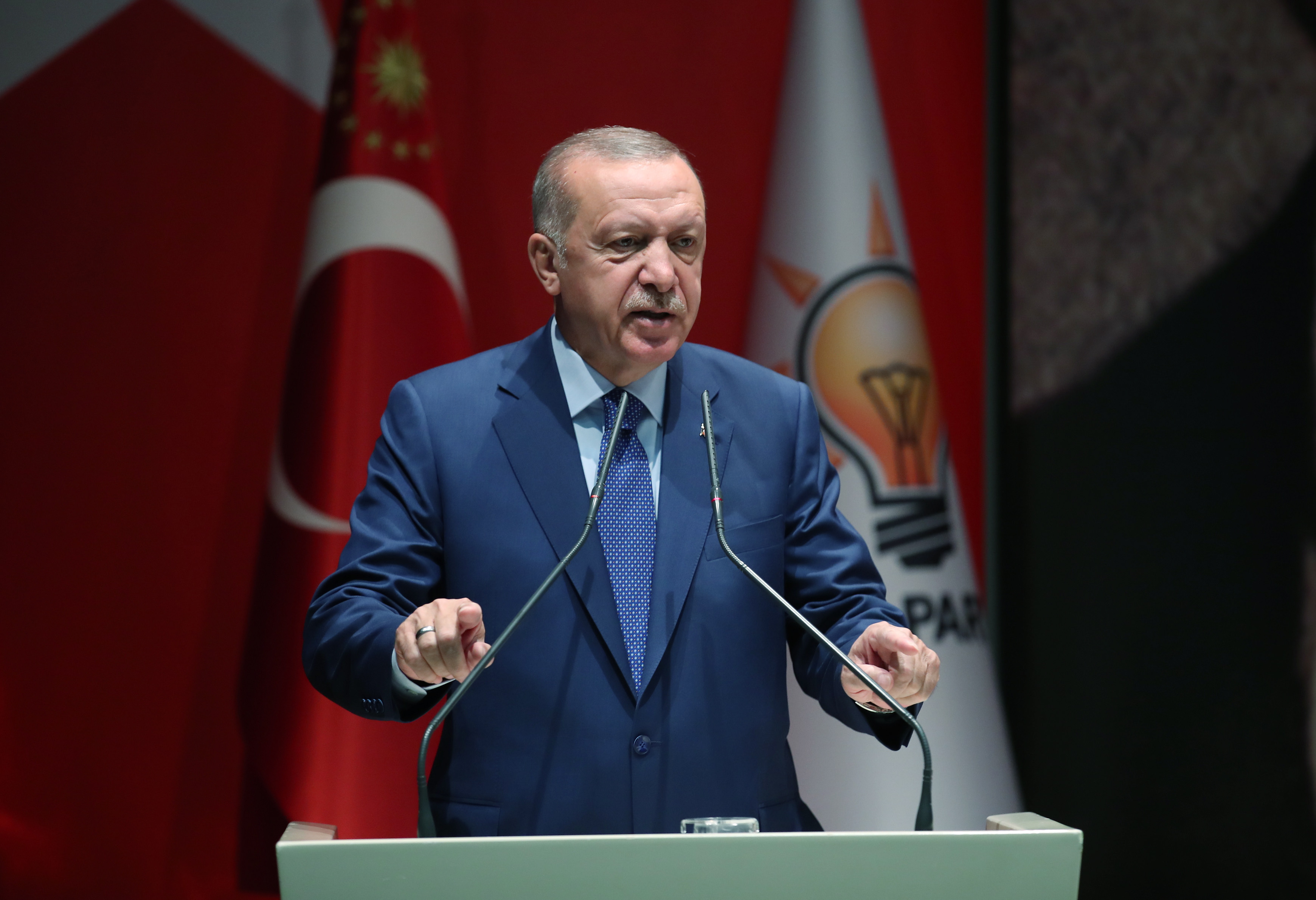 epa07820634 A handout photo made available by the Presidential press office shows Turkish President and leader of Justice and Development (AKP) Party Recep Tayyip Erdogan addresses at AK Party's extended meeting of Provincial heads in Ankara, Turkey, 05 September 2019. Erdogan said, Turkey may reopen the route for refugees and migrants into Europe if it does not receive international support to enable it to cope with the millions of refugees in Turkey.  EPA/PRESIDENTIAL PRESS OFFICE / HANDOUT  HANDOUT EDITORIAL USE ONLY/NO SALES