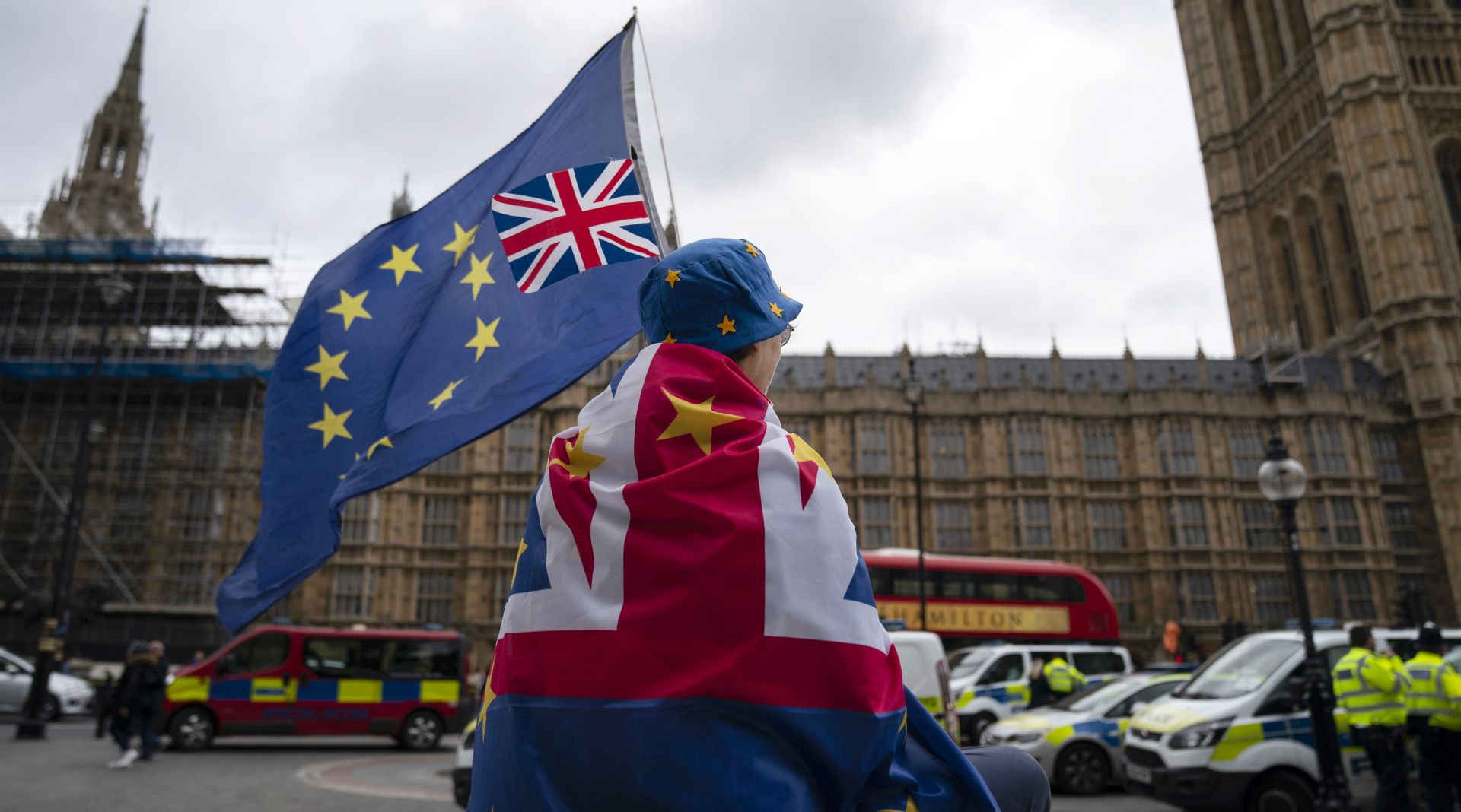 epa07835611 An Anti-Brexit protester sits outside the Houses of Parliament, Central London, Britain, 11 September 2019. Judges at the Court of Session in Scotland ruled today that proroguing of Parliament by British Prime Minister Boris Johnson was unlawful and the case will be heard at the Supreme Court in London next week.  EPA/WILL OLIVER