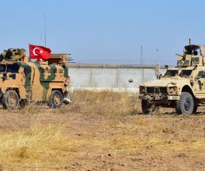 epa07865128 A handout photo made available by the Turkish Minister of Defence Press Office shows Turkish army vehicles driving back to Turkish territories after taking part in the second Turkish and US army ground patrol in Northern Syria, in Tal Abyad city, near Akcakale district in Sanliurfa, Turkey, 24 September 2019. Turkey and the US began joint patrols in northern Syria in order to establish a safe zone.  EPA/TURKISH MINISTRY OF DEFENCE HANDOUT  HANDOUT EDITORIAL USE ONLY/NO SALES