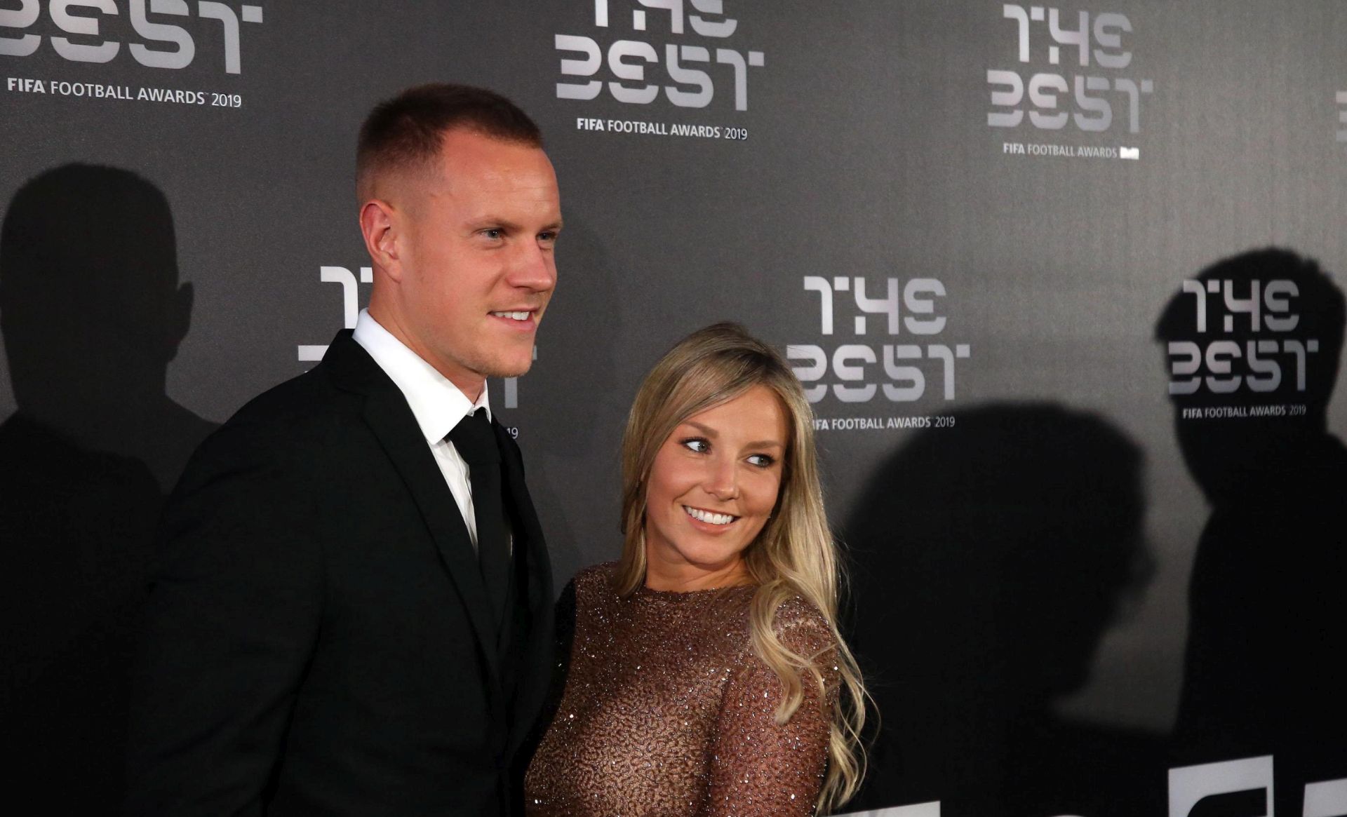 epa07866155 Picture made available 24 September 2019 of German goalkeeper Marc-Andre ter Stegen (L) and his wife Daniele Jehle arriving for the Best FIFA Football Awards 2019 in Milan, Italy, 23 September 2019.  EPA/MATTEO BAZZI