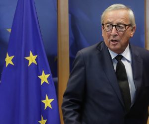 epa07871314 European Commission President Jean Claude Juncker wears a black tie to pay tribute to the late French former president Jacques Chirac prior to a meeting in Brussels, Belgium, 26 September 2019.  EPA/OLIVIER HOSLET