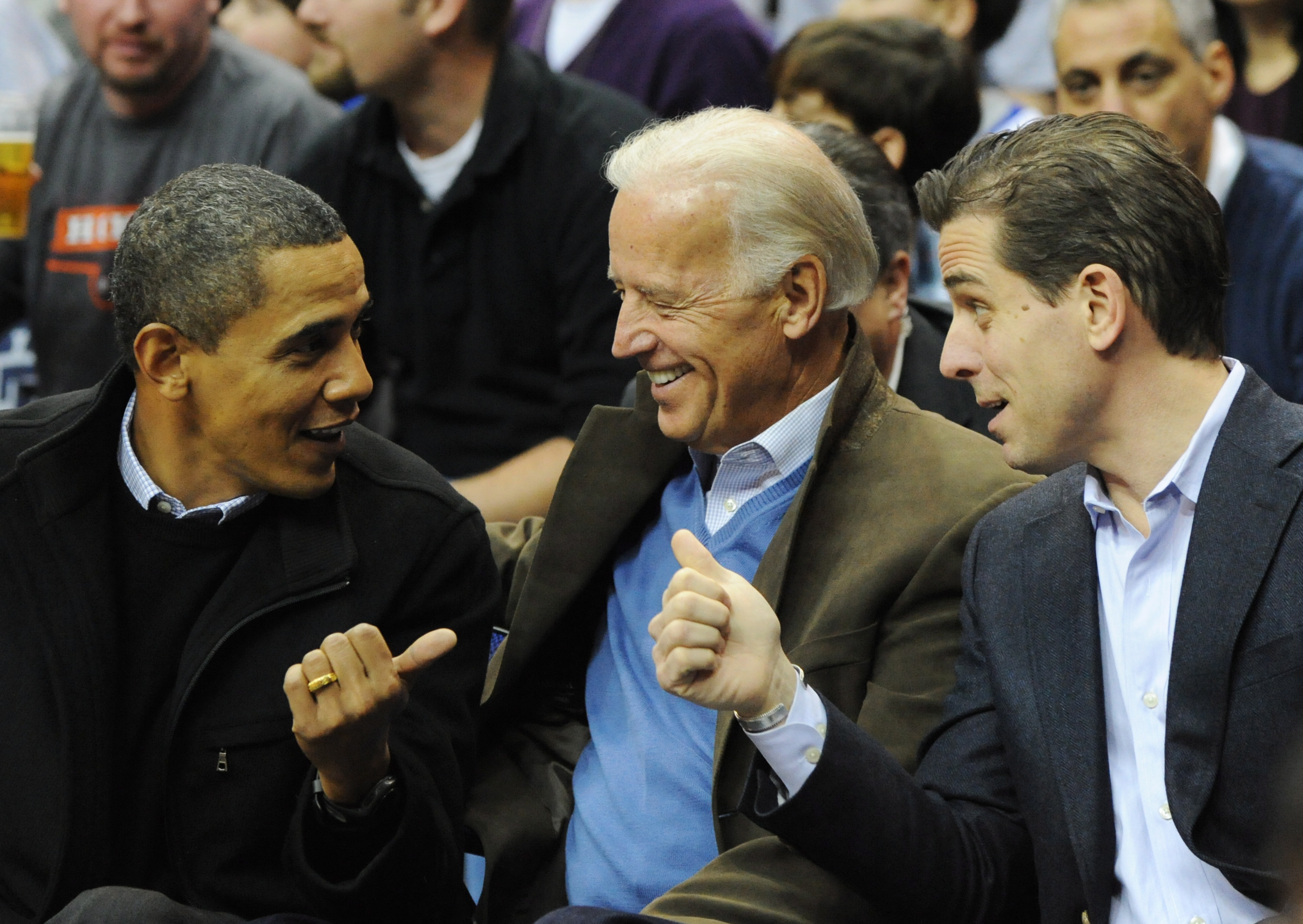 epa07872758 (FILE) - Then US President Barack Obama (L) greets then Vice President Joe Biden (C) and his son Hunter Biden as they attend a college basketball game, at the Verizon Center in Washington, DC, USA, 30 January 2010(reissued 27 September 2019). An impeachment inquiry against US President Donald J. Trump has been initiated following a whistleblower complaint over his dealings with Ukraine. The whistleblower alleges that Trump had demanded Ukrainian investigations into US Presidential candidate Joe Biden and his son Hunter Biden's business involvement in Ukraine.  EPA/ALEXIS C. GLENN / POOL *** Local Caption *** 02011904