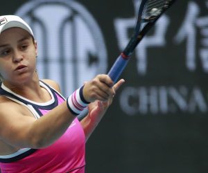 epa07894473 Ashleigh Barty of Australia in action against Petra Kvitova of Czech Republic during their women’s singles quarter-final match at the China Open Tennis tournament in Beijing, China, 04 October 2019.  EPA/HOW HWEE YOUNG