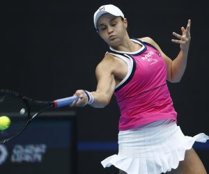 epa07897284 Ashleigh Barty of Australia in action against Kiki Bertens of The Netherlands during their women's singles semi-final match at the China Open tennis tournament in Beijing, China, 05 October 2019.  EPA/WU HONG