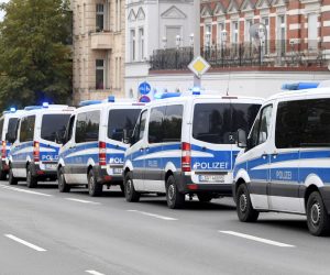 epa07907593 Police cars stand near a Synagogue after a shooting in Halle, Germany, 09 October 2019. According to the police two people were killed in shootings in front of a Synagogue and a Kebab shop in the Paulus district of Halle in the East German federal state of Saxony-Anhalt. Police stated a suspect is already in arrest. Media report the mayor of Halle speaks of an amok situation.  EPA/FILIP SINGER