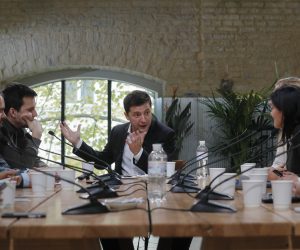 epa07909509 Ukrainian President Volodymyr Zelensky (C) speaks with journalists during a press marathon on Kiev's Food Market venue in Kiev, Ukraine, 10 October 2019. President Zelensky answers the questions of journalists throughout the day during the press marathon.  EPA/SERGEY DOLZHENKO