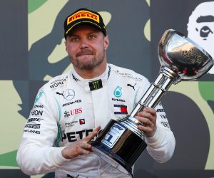 epa07916822 Finnish Formula One driver Valtteri Bottas of Mercedes AMG GP lifts his trophy after winning the Japanese Formula One Grand Prix in Suzuka, Japan, 13 October 2019.  EPA/DIEGO AZUBEL