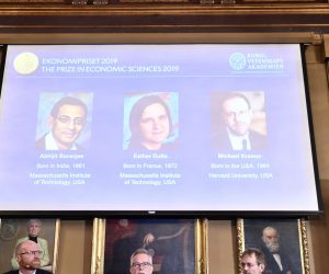 epa07919681 Goran K Hansson (C), Secretary General of the Royal Swedish Academy of Sciences, and academy members Peter Fredriksson  (L) and Jakob Svensson, announce whe winners of the 2019 Nobel Prize in Economics during a news conference at the Royal Swedish Academy of Sciences in Stockholm, Sweden, 14 October 2019. Abhijit Banerjee, Esther Duflo, and Michael Kremer receive this year's Nobel Prize in Economics.  EPA/Karin Wesslen SWEDEN OUT
