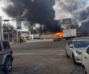 epaselect epa07928937 A view of vehicles on fire during a clash between armed gunmen and Federal police and military soldiers, in the streets of the city of Culiacan, Sinaloa state, Mexico, 17 October 2019. According to media reports, alleged drug cartel gunmen set up blockades and unleashed volleys of gunfire in the Mexican city of Culiacan amid rumors of the capture of Ovidio Guzman Lopez, son of imprisoned drug trafficker Joaquin 'El Chapo' Guzman Loera. The blockades set up by the gunmen, presumably from the Sinaloa drug cartel, extended to the exits of the city.  EPA/STR