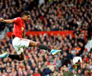 epa07937058 Manchester United's Marcus Rashford scores the 1-0 lead during the English Premier League soccer match between Manchester United and Liverpool FC at Old Trafford in Manchester, Britain, 20 October 2019.  EPA/PETER POWELL EDITORIAL USE ONLY.  No use with unauthorized audio, video, data, fixture lists, club/league logos or 'live' services. Online in-match use limited to 120 images, no video emulation. No use in betting, games or single club/league/player publications.