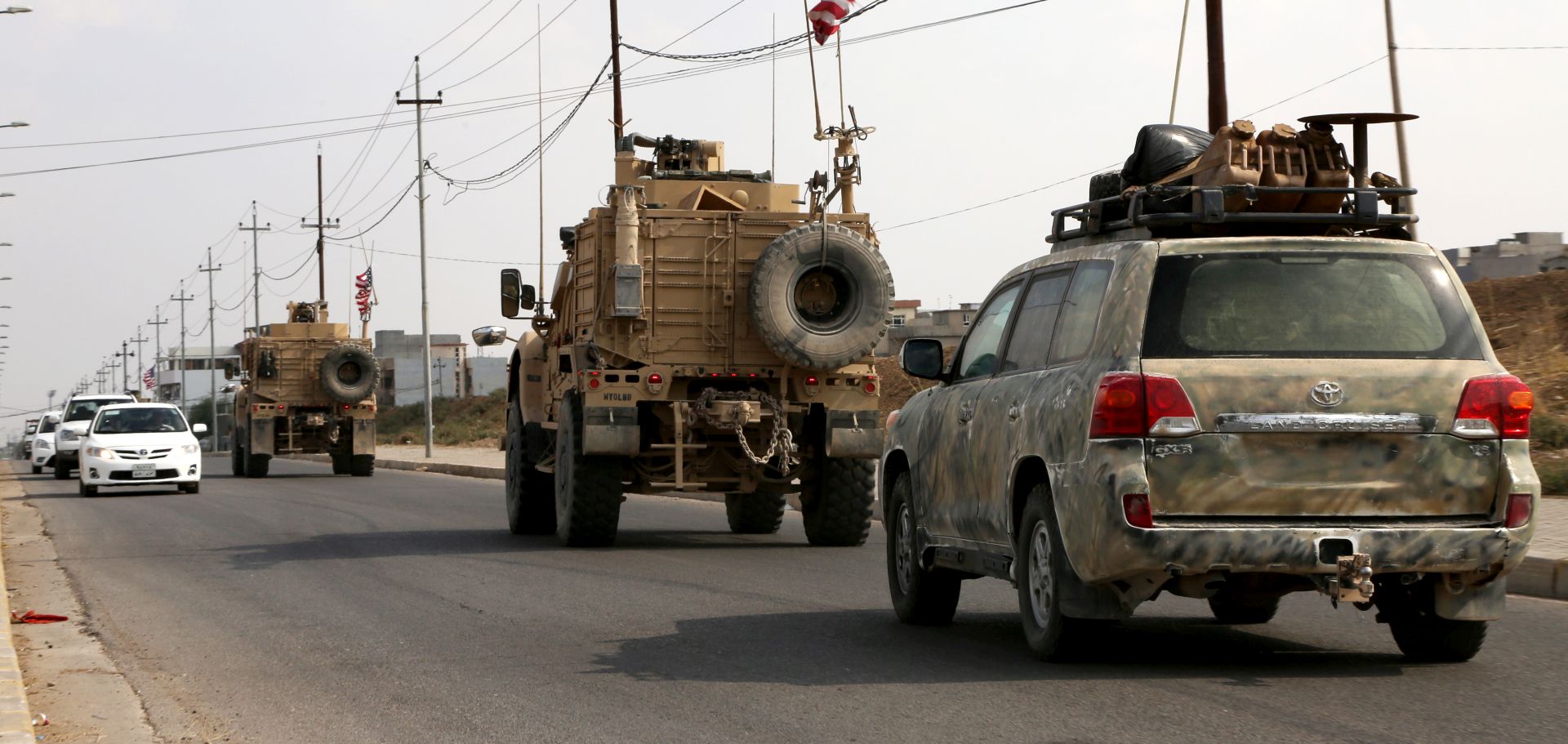 epa07938275 A convoy of US troops arrives back from northeastern of Syria, in Duhok, Kurdistan region, Iraq, 21 October 2019. Media reported the US troops started their withdrawal from north Syria towards Iraq according to agreement between US and Turkey.  Turkey has launched an offensive targeting Kurdish forces in north-eastern Syria on 09 October, days after the US withdrew troops from the area.  EPA/GAILAN HAJI