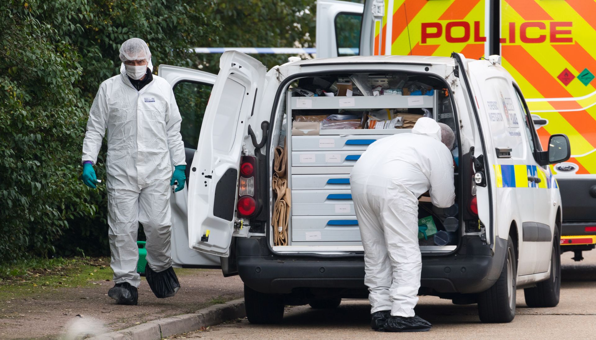 epa07942771 Police and forensic officers investigate at the scene in Waterglade Industrial Park in Grays, Essex, Britain, 23 October 2019. A total of 39 bodies were discovered inside a lorry container in the early hours of this morning, and pronounced dead at the scene.  EPA/VICKIE FLORES