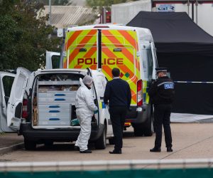 epa07942769 Police and forensic officers investigate at the scene in Waterglade Industrial Park in Grays, Essex, Britain, 23 October 2019. A total of 39 bodies were discovered inside a lorry container in the early hours of this morning, and pronounced dead at the scene.  EPA/VICKIE FLORES