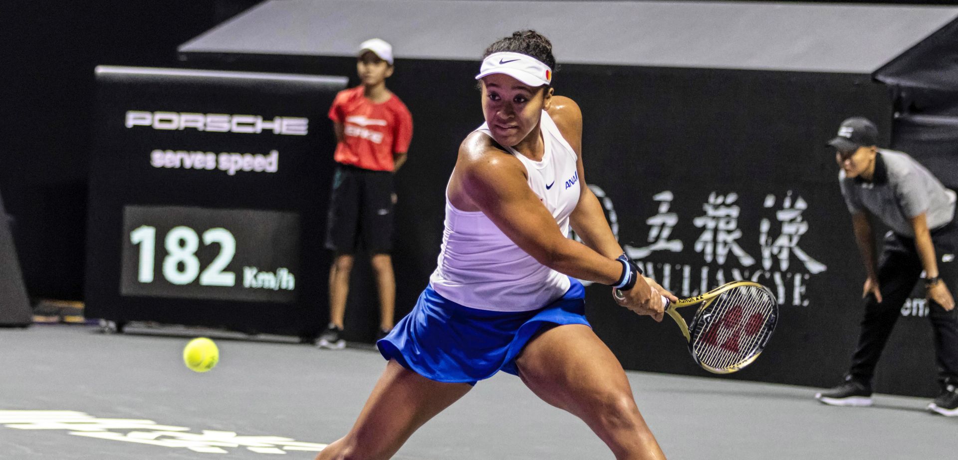 epa07953321 Naomi Osaka of Japan in action against Petra Kvitova of the Czech Republic during their group match at the WTA Finals 2019 tennis tournament in Shenzhen, China, 27 October 2019.  EPA/ALEX PLAVEVSKI