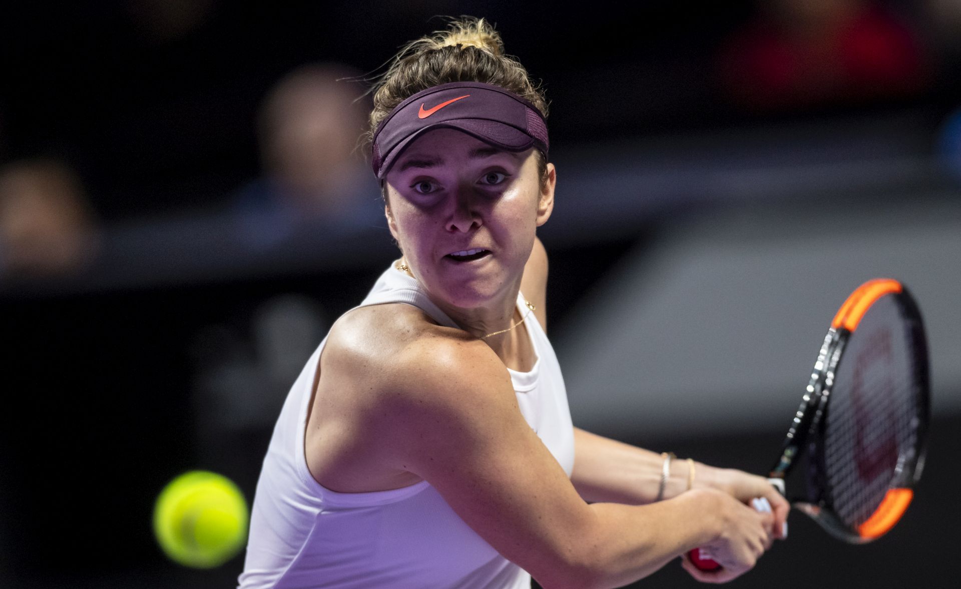 epa07959729 Elina Svitolina of Ukraine in action against Simona Halep of Romania during their match at the WTA Finals 2019 tennis tournament in Shenzhen, China, 30 October 2019.  EPA/ALEX PLAVEVSKI