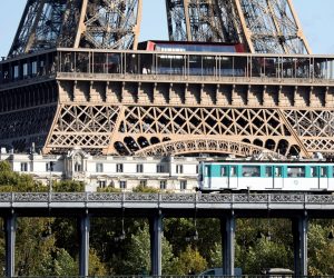 A metro passes by a residential apartment building near the Eiffel Tower in Paris A metro passes by a residential apartment building near the Eiffel Tower in Paris, France, October 18, 2019. REUTERS/Charles Platiau CHARLES PLATIAU
