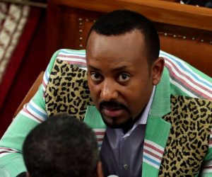 FILE PHOTO: Ethiopia's Prime Minister Abiy Ahmed talks to an unidentified legislator inside the House of Peoples' Representatives in Addis Ababa FILE PHOTO: Ethiopia's Prime Minister Abiy Ahmed talks to an unidentified legislator inside the House of Peoples' Representatives in Addis Ababa, Ethiopia October 25, 2018. REUTERS/Tiksa Negeri/File Photo Tiksa Negeri