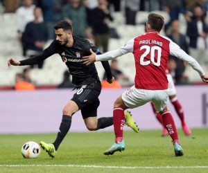 epa07946402 SC Braga's Joao Palhinha (R) in action against Besiktas' Oguzhan Ozyakup (L) during the UEFA Europa League group K match between Besiktas and SC Braga in Istanbul, Turkey, 24 October 2019.  EPA/ERDEM SAHIN