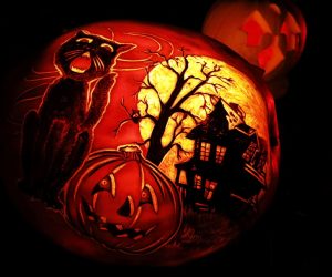 epa07950230 A pumpkins are displayed during the Night of the 1,000 Jack-o'-Lanterns on Governors Island in New York, USA, 25 October 2019. The Night of the 1,000 Jack-o'-Lanterns sees some of the USA's best pumpkin sculptors carve pumpkins to celebrate the lead up to Halloween.  EPA/JASON SZENES
